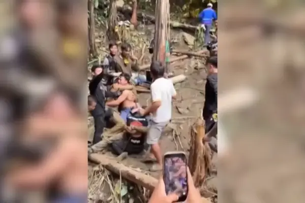 Heavy rains delay the search for the other two people trapped in a cave in Laos