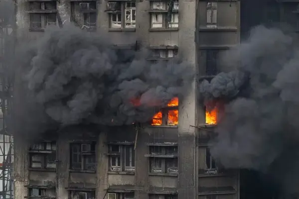 Report points to a cigarette butt as the cause of the fire that left 168 dead in Hong Kong