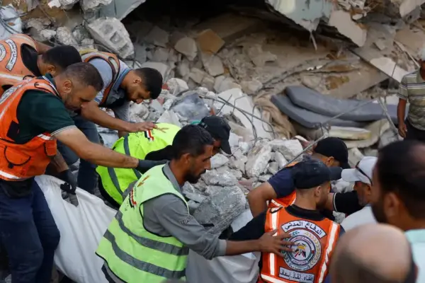Death toll rises to 16 in building collapse where dozens of displaced people lived in Gaza