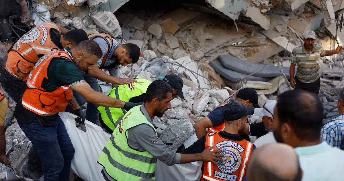 Death toll rises to 16 in building collapse where dozens of displaced people lived in Gaza